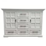 White wooden dresser with multiple drawers and cabinet doors.