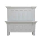 Elegant white wooden bed frame with detailed paneling and crown molding.