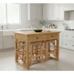 Wooden kitchen island with four stools in a bright modern kitchen.